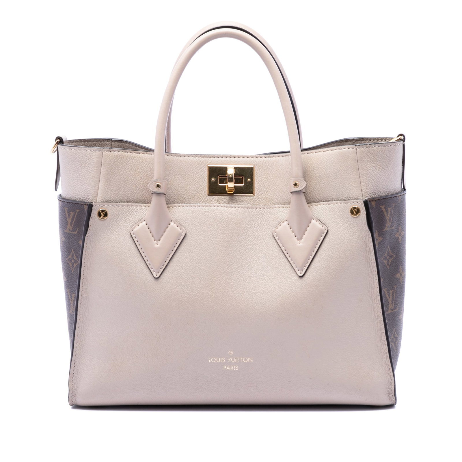 Louis Vuitton On My Side MM Beige Leather Tote: Louis Vuitton On My Side MM Beige Leather Tote This Louis Vuitton Monogram On My Side MM bag features a leather body with monogram canvas side panels, rolled leather handles, and an open top with a tw
