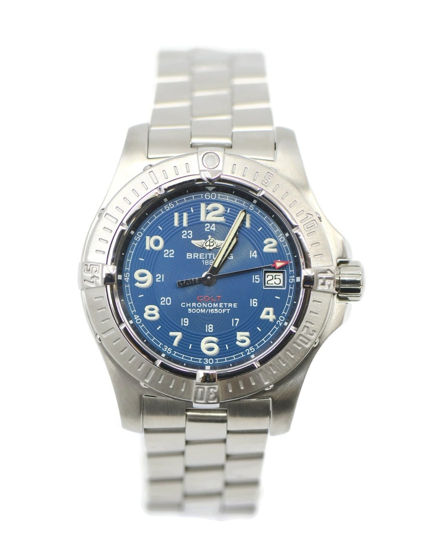 Colt A74380 Blue Dial Stainless Steel Quartz Men's Watch With Box: Colt A74380 Blue Dial Stainless Steel Quartz Men's Watch With Box This Breitling Colt wristwatch features a stainless steel case and band, complemented by a blue analog dial. Designed for men, the wat