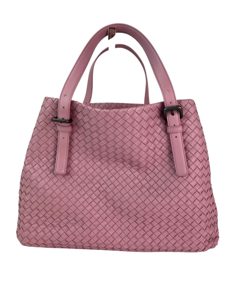 Bottega Veneta Nappa Intrecciato Large Rose Pink Tote Bag: Bottega Veneta Nappa Intrecciato Large Rose Pink Tote Bag Introducing the Bottega Veneta Nappa Intrecciato Large Seamless Tote Bag in a delightful rose pink hue. This exquisite tote combines elegance 