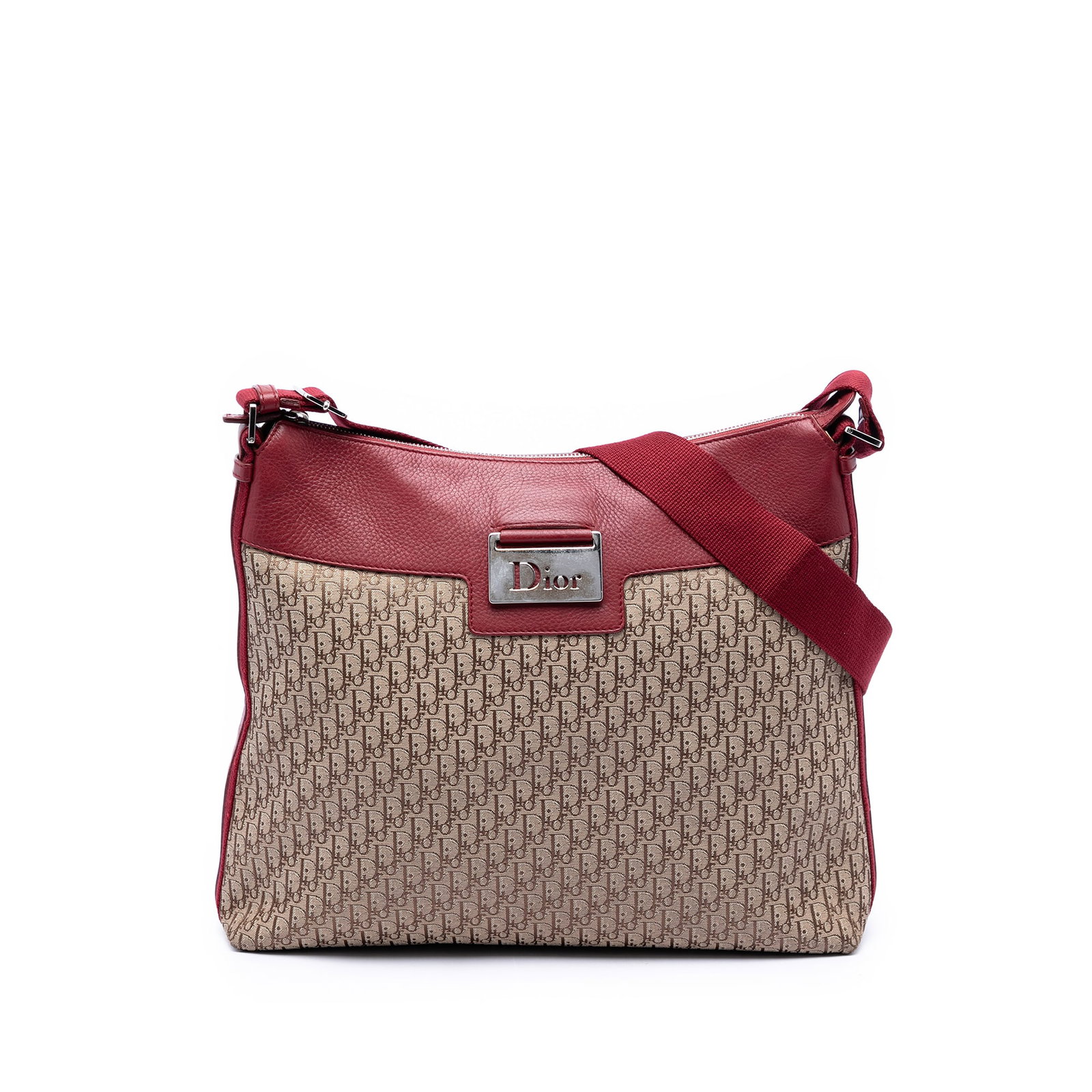 Dior Street Chic Crossbody in Diorissimo Trotter Canvas: Dior Street Chic Crossbody in Diorissimo Trotter Canvas A Diorissimo Trotter Street Chic crossbody bag in brown canvas with leather trim. This crossbody style features an adjustable flat shoulder stra
