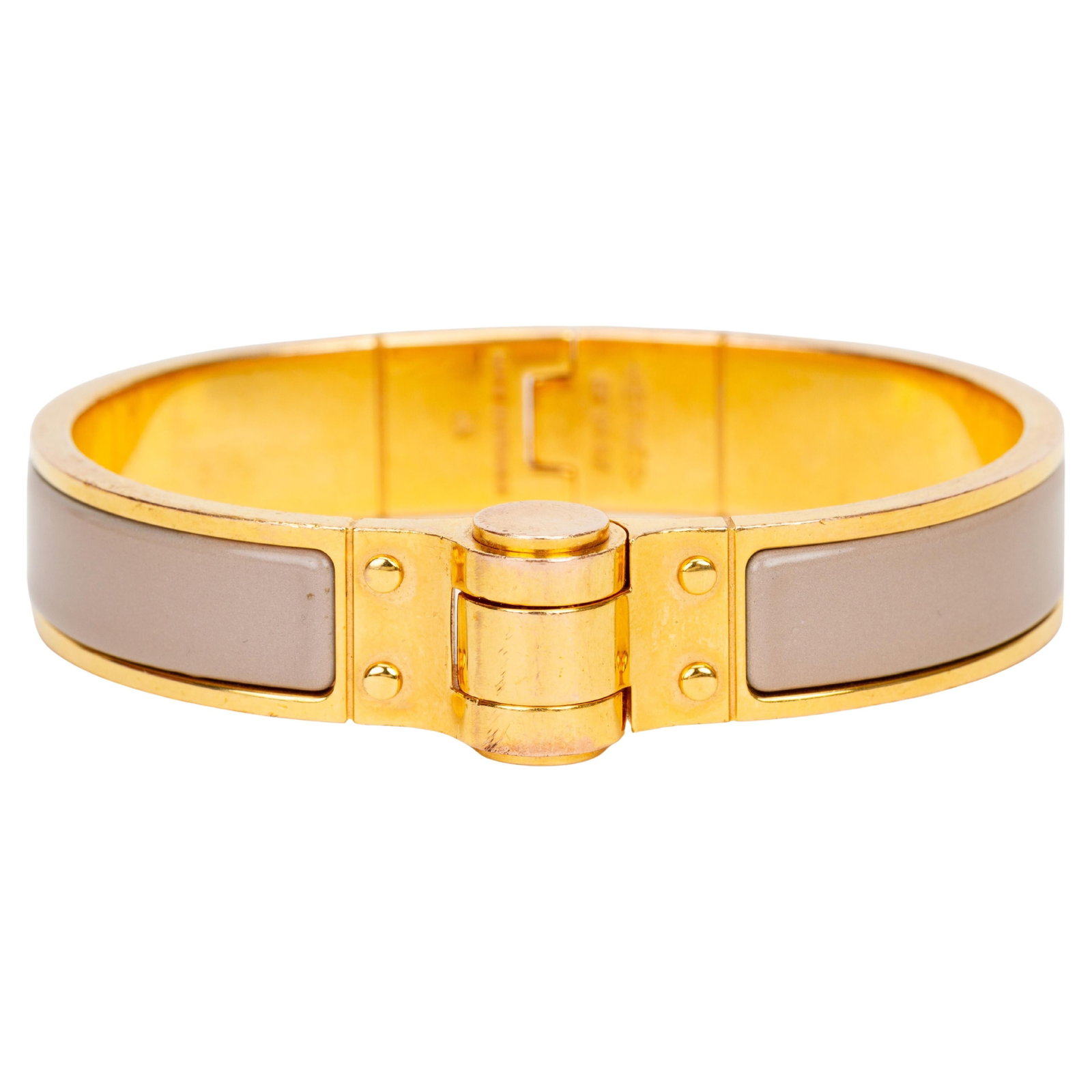 Hermes H Narrow Enamel Bracelet Mauve Gold Tone: Hermes H Narrow Enamel Bracelet Mauve Gold Tone Hermes "H" hinged narrow bracelet in mauve enamel with gold-tone clasp and edges. Made in France, this 21st-century piece dates to 2020 and comes with a