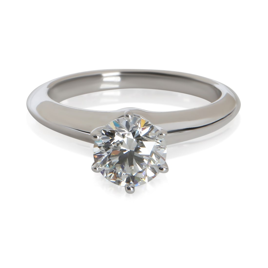 Tiffany & Co Platinum Round Diamond Engagement Ring 0.97 ct Size 5: Tiffany & Co Platinum Round Diamond Engagement Ring 0.97 ct Size 5 This pre-owned Tiffany & Co. engagement ring features a 0.97 carat round brilliant diamond set in platinum. The center diamond is gra