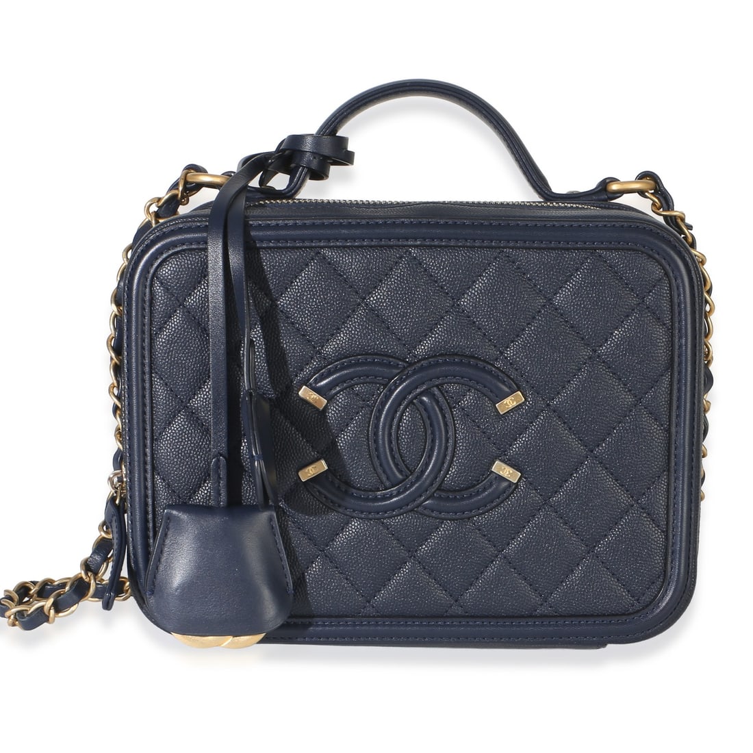 Chanel Medium Filigree Vanity Case Blue Quilted Leather Bag: Chanel Medium Filigree Vanity Case Blue Quilted Leather Bag A pre-owned medium vanity case in navy quilted caviar leather, presented in a shoulder bag and top handle style. It features a zip-around cl