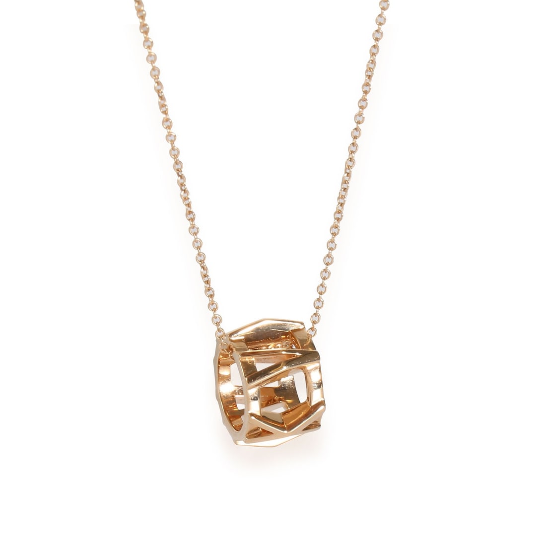Tiffany & Co. Atlas 18k Rose Gold Pendant Necklace with Box: Tiffany & Co. Atlas 18k Rose Gold Pendant Necklace with Box A pre-owned Tiffany & Co. Atlas pendant in rose gold with a geometric design from the Atlas collection. The piece is unisex and comes with t