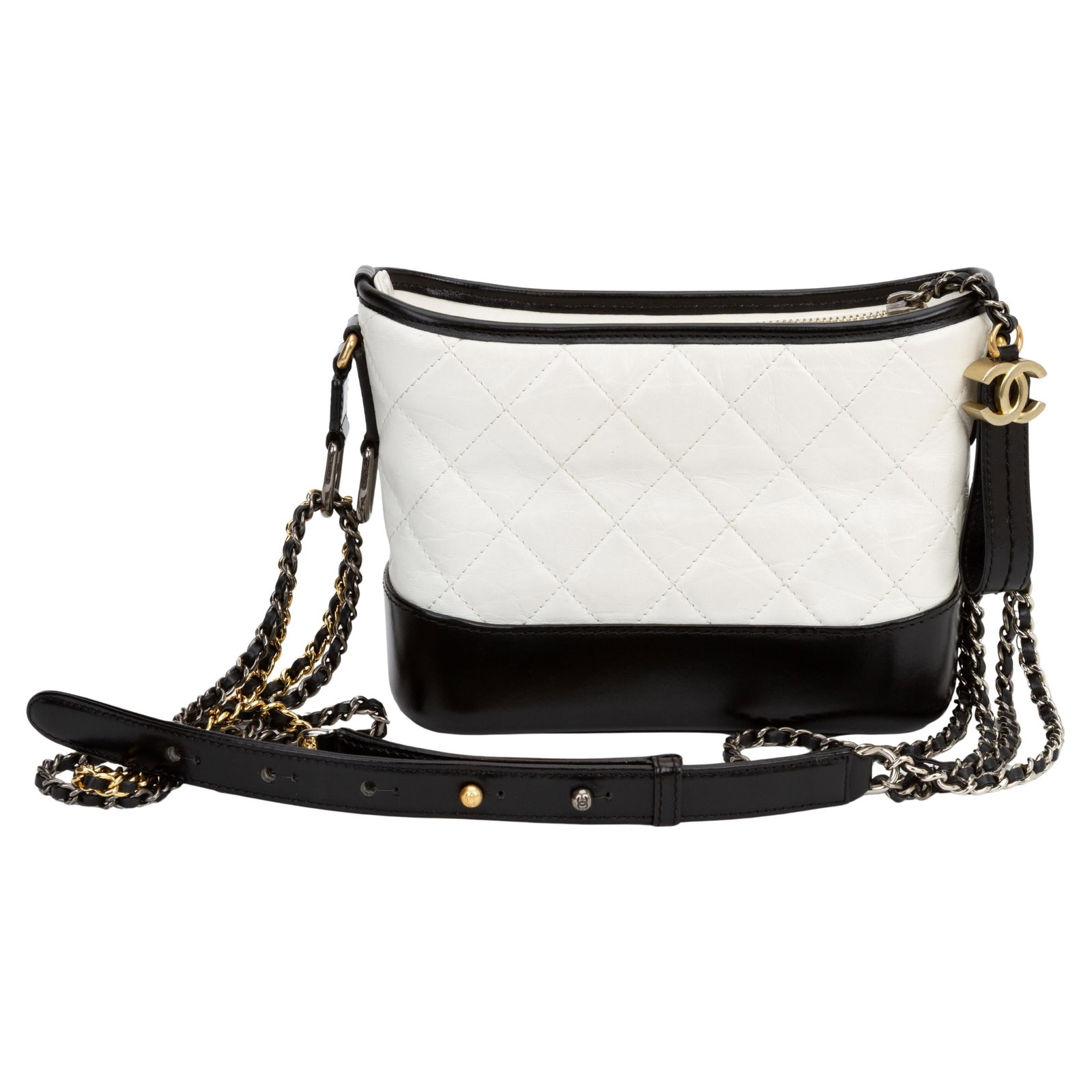 Chanel Gabrielle Small Hobo Black White Quilted Calfskin: Chanel Gabrielle Small Hobo Black White Quilted Calfskin Chanel Gabrielle Small hobo bag in black and white quilted calfskin with a black leather base. The design features a black leather threaded cha
