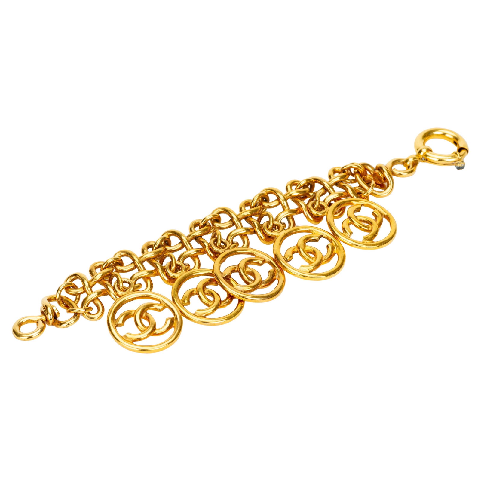 Chanel Vintage 1993 Gold Tone Medallion Charm Bracelet with CC Logos: Chanel Vintage 1993 Gold Tone Medallion Charm Bracelet with CC Logos Vintage Chanel gold-plated charm bracelet from the Spring 1993 Collection by Karl Lagerfeld. This piece features multiple circular 