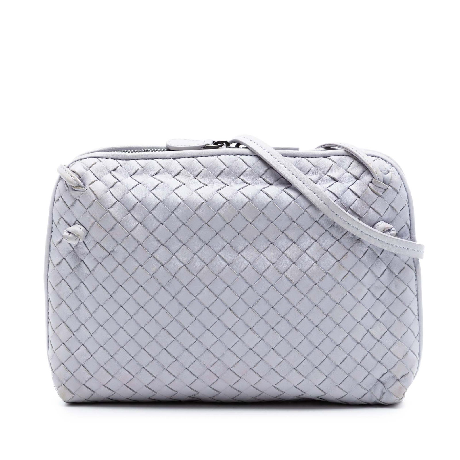 Purple Leather Crossbody Bottega Veneta Nodini Intrecciato Nappa: Purple Leather Crossbody Bottega Veneta Nodini Intrecciato Nappa This Bottega Veneta Nodini crossbody bag is crafted in purple woven leather with the brand's signature Intrecciato design. It features 