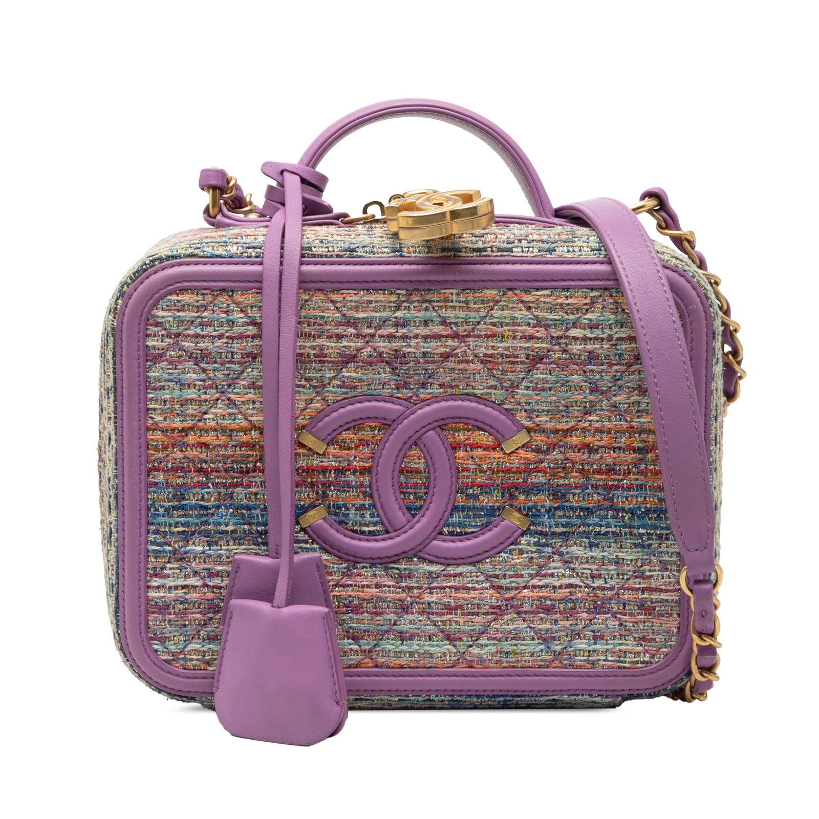 Chanel purple tweed vanity case CC filigree medium: Chanel purple tweed vanity case CC filigree medium This Chanel Medium Tweed CC Filigree Vanity Case features a quilted tweed body with leather trim, a flat leather top handle, and a leather-woven chai