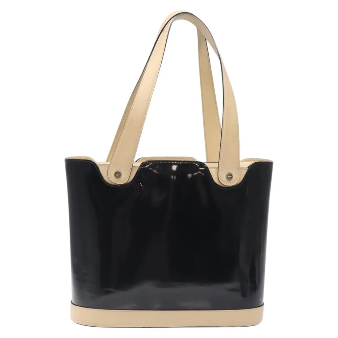 Black Patent Leather Vintage Tote by Salvatore Ferragamo: Black Patent Leather Vintage Tote by Salvatore Ferragamo This vintage Salvatore Ferragamo tote bag is crafted from black patent leather and designed for women. It features a spacious interior and clas