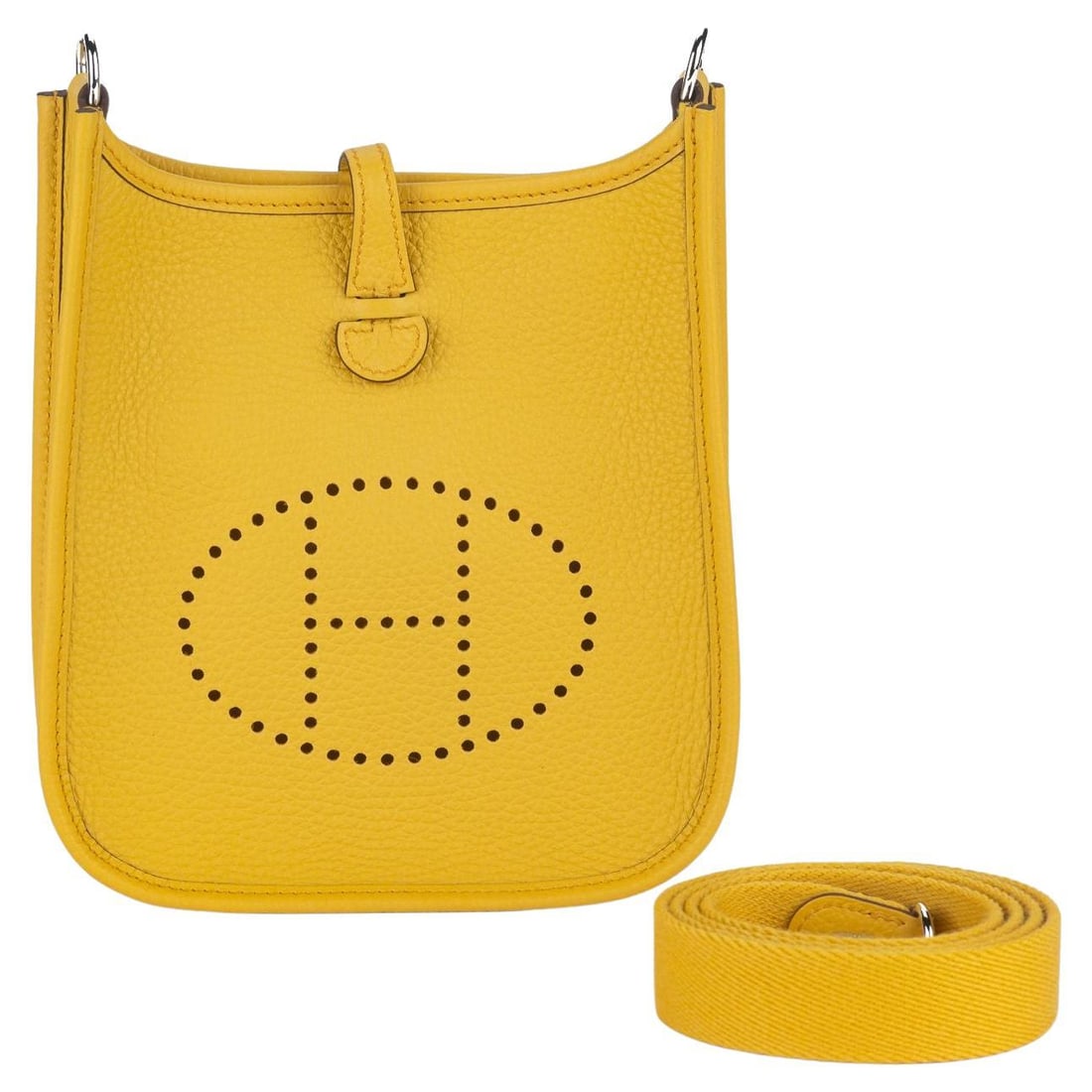 Hermes Evelyne Mini Clemence Bag Jaune Ambre with Strap: Hermes Evelyne Mini Clemence Bag Jaune Ambre with Strap Hermes Mini Evelyne bag in jaune ambre Clemence leather with palladium hardware. This bag features a detachable flat strap, an open top with tuc