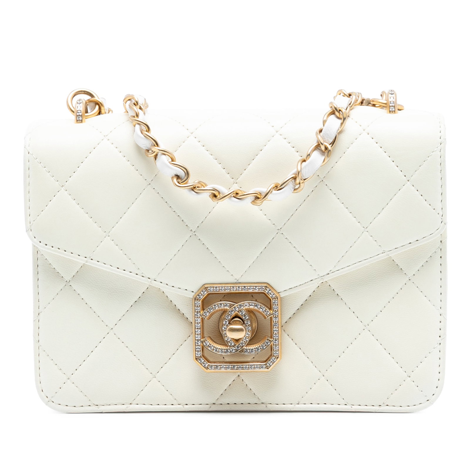 Chanel White Lambskin Flap Bag with Crystal CC Turn-Lock Closure: Chanel White Lambskin Flap Bag with Crystal CC Turn-Lock Closure This Chanel flap bag features a quilted lambskin leather body in white, accented by a leather-woven chain strap with a shoulder guard. 