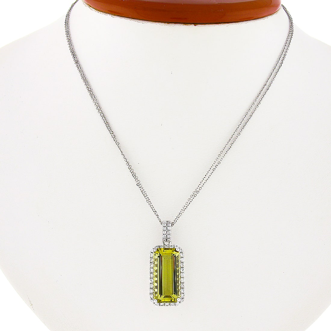 18K White Gold Lemon Quartz Diamond Pendant Necklace 17 Inch: 18K White Gold Lemon Quartz Diamond Pendant Necklace 17 Inch This exquisite pendant necklace features a stunning rectangular lemon quartz gemstone set in solid 18K white gold. The vibrant yellow lemon
