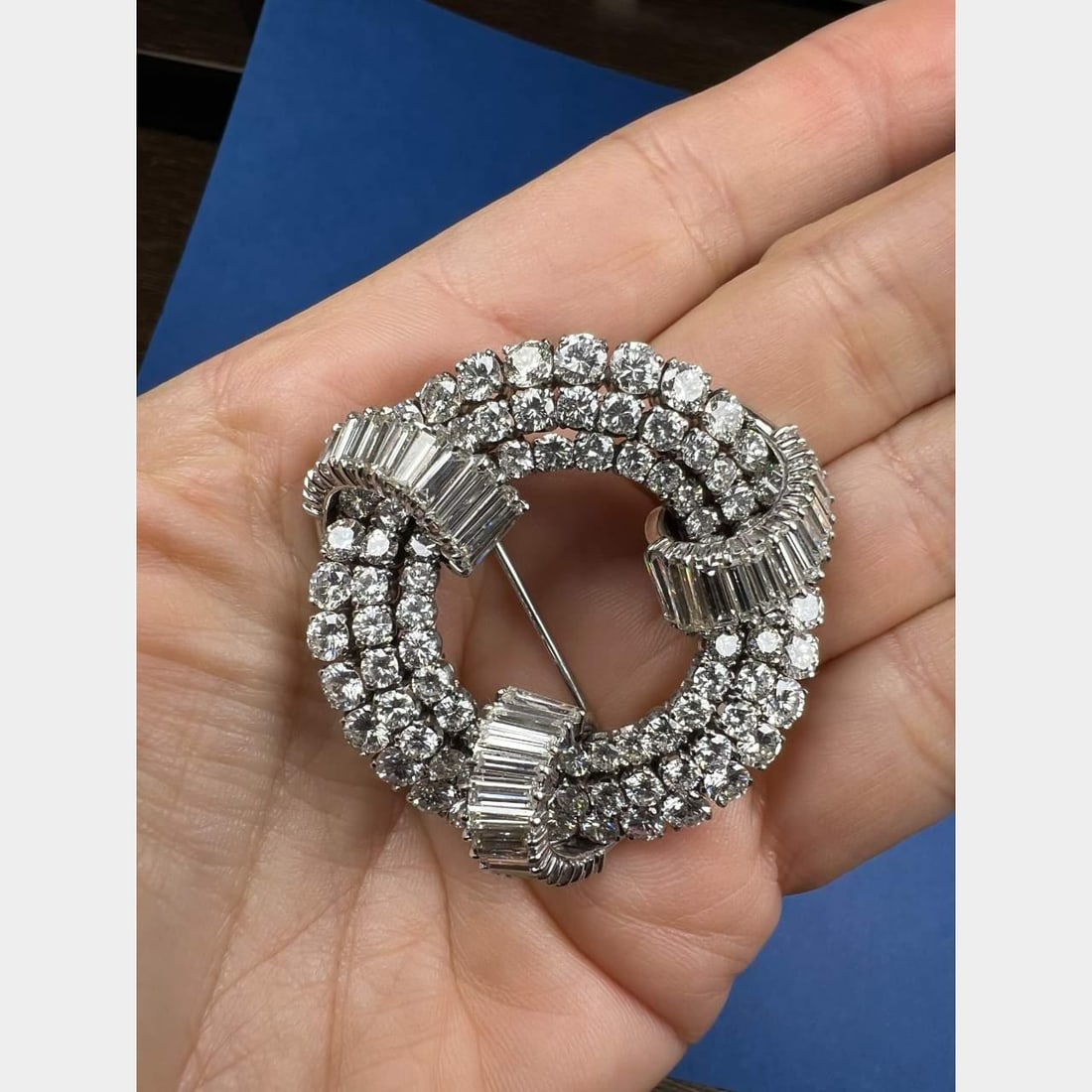 Art Deco Platinum Diamond Brooch 24.00 Ct 94 Round 45 Baguette Diamonds: Art Deco Platinum Diamond Brooch 24.00 Ct 94 Round 45 Baguette Diamonds This exquisite Art Deco brooch is crafted in platinum and features a stunning total diamond weight of 24.00 carats. The piece is