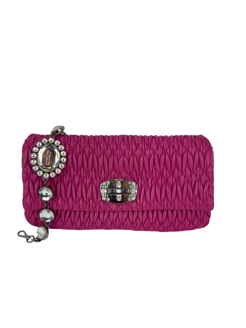 Miu Miu Pink Lambskin Nappa Crystal Shoulder Clutch Bag: Miu Miu Pink Lambskin Nappa Crystal Shoulder Clutch Bag This Miu Miu Pink Lambskin Nappa Crystal Shoulder Clutch Bag combines elegance with functionality. Designed in a chic rectangular shape, it feat