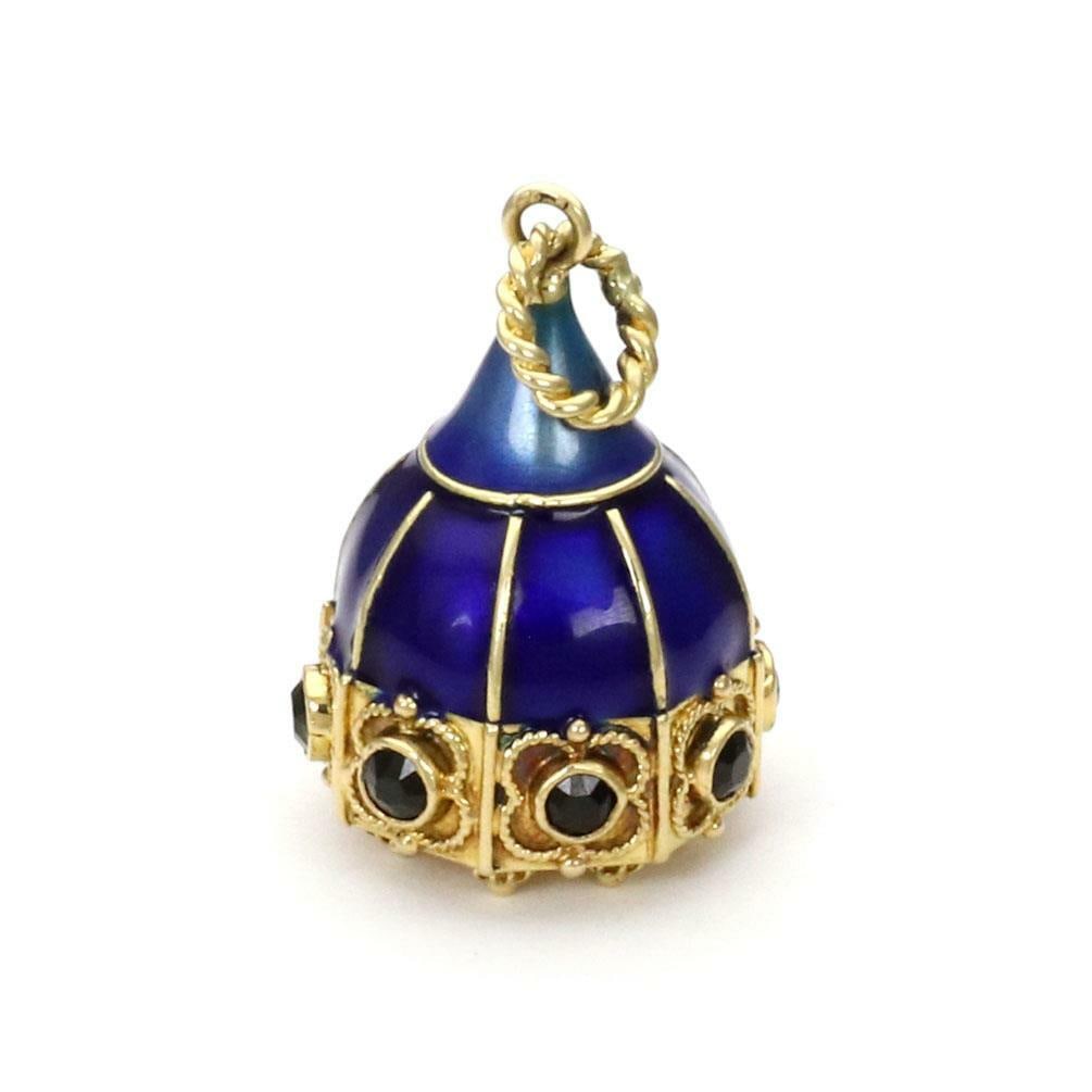 Vintage 18k Yellow Gold Bell Charm Pendant with Sapphire and Enamel: Vintage 18k Yellow Gold Bell Charm Pendant with Sapphire and Enamel This vintage charm pendant features a bell-shaped design crafted from 18k yellow gold. It is adorned with cobalt blue and green enam
