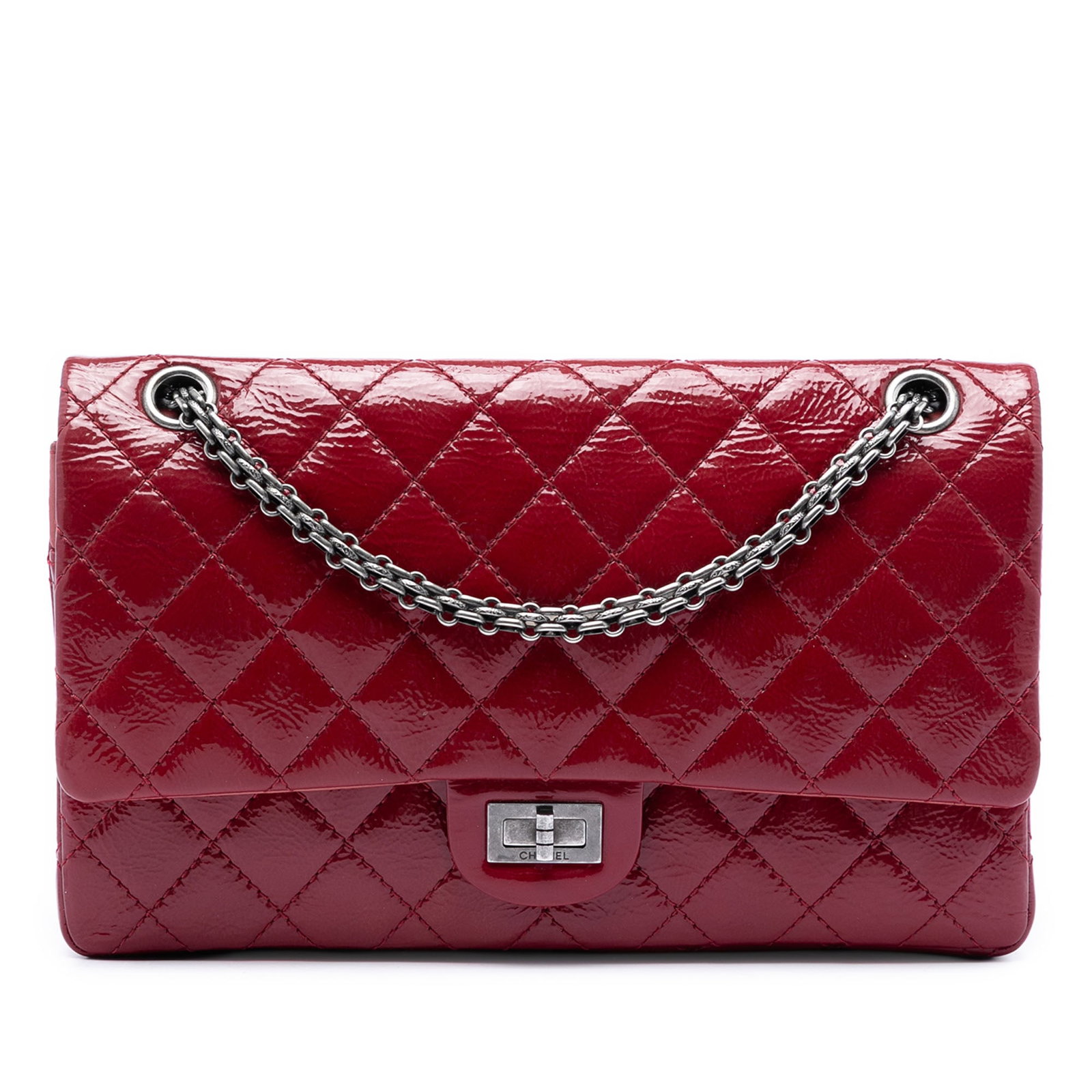 Chanel Reissue 2.55 226 red quilted patent leather flap bag: Chanel Reissue 2.55 226 red quilted patent leather flap bag A Chanel crossbody bag in the Quilted Crinkled Patent Reissue 2.55 Double Flap 226 style, made in red patent leather with a quilted body. It