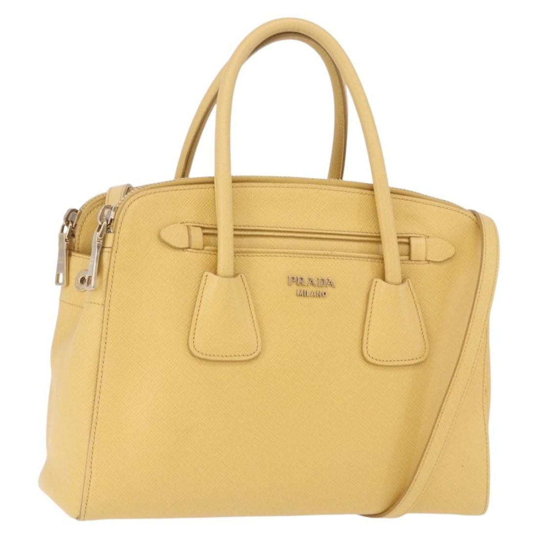 Prada Saffiano Leather 2 Way Handbag Yellow Gold with Strap: Prada Saffiano Leather 2 Way Handbag Yellow Gold with Strap PRADA handbag in yellow/gold Saffiano leather with a 2-way design. It features a shoulder strap and handles, and was made in Italy. Included