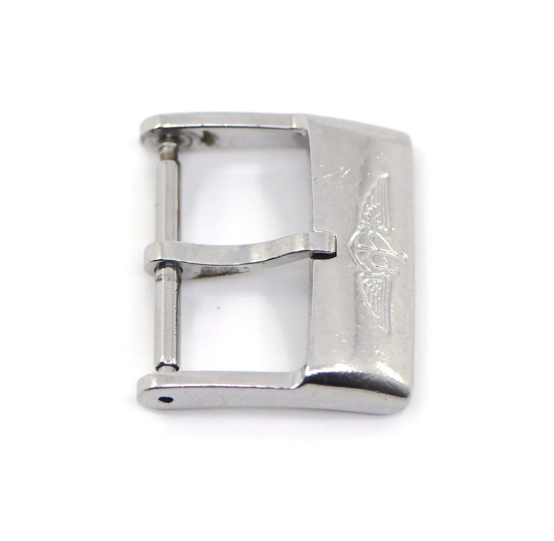 Authentic Breitling Stainless Steel Wristwatch Buckle 18mm: Authentic Breitling Stainless Steel Wristwatch Buckle 18mm This authentic Breitling stainless steel buckle is designed for wristwatches and features a band width of 18 mm. The durable stainless steel 