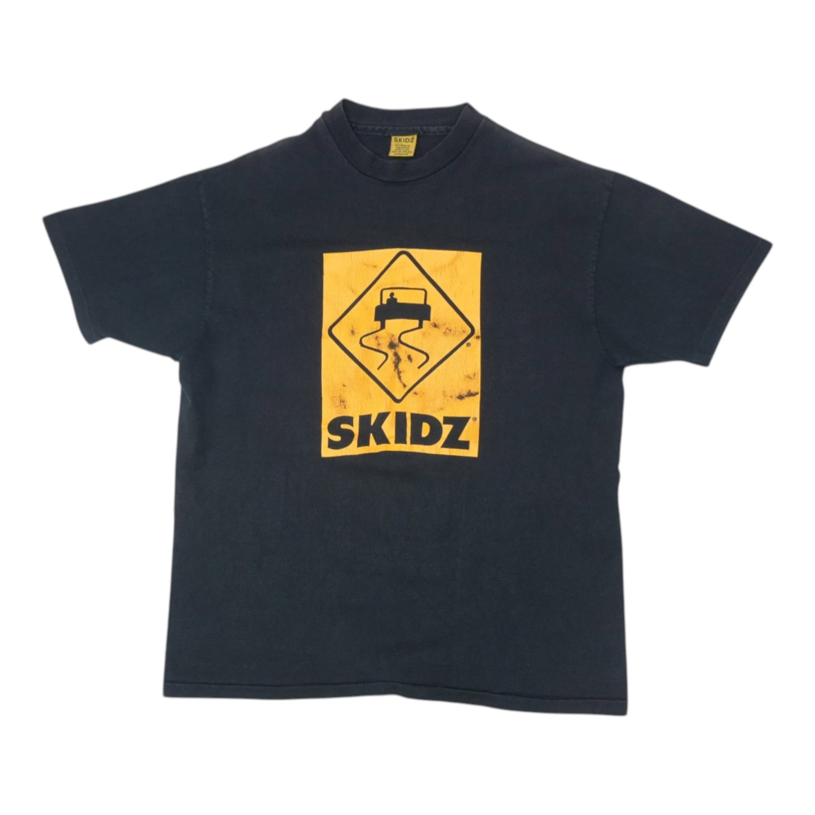 Vintage 1990s Black Cotton Skidz T-Shirt OSFA Size: Vintage 1990s Black Cotton Skidz T-Shirt OSFA Size This is an original vintage Skidz shirt from the 1990s, crafted from 100% cotton fabric. The black shirt features no graphics on the back and is in e