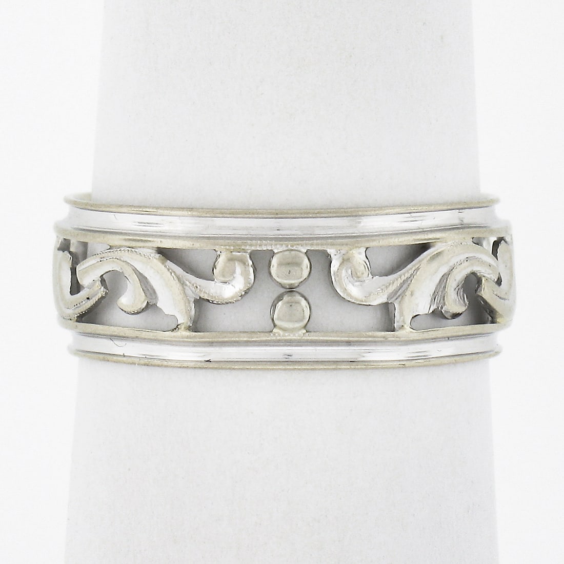 Vintage 14k White Gold Floral Eternity Band Ring 6.5mm: Vintage 14k White Gold Floral Eternity Band Ring 6.5mm This exquisite Vintage 14k White Gold Eternity Band Ring showcases a charming pierced open floral design that wraps around the entire band, beaut
