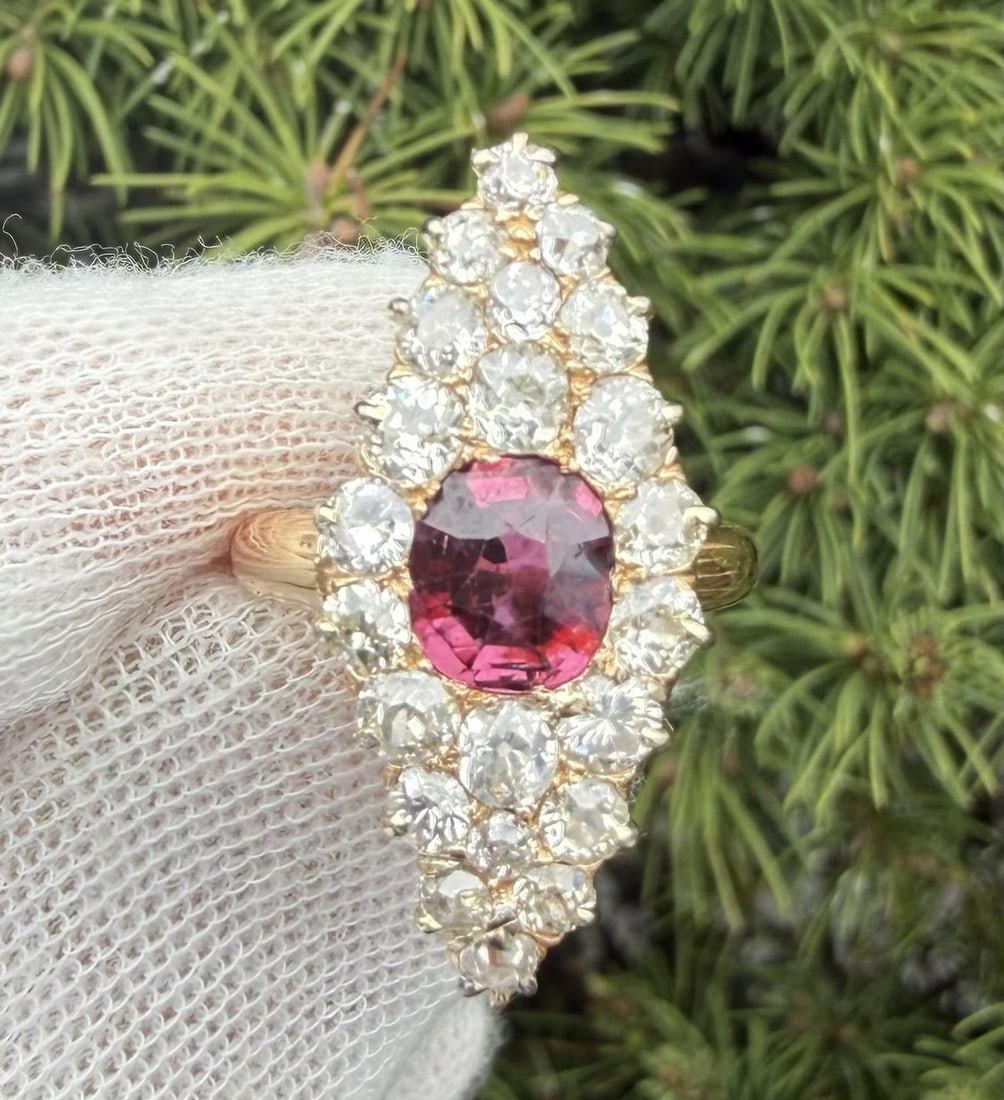 Victorian Yellow Gold Navette Ring With GIA Ruby and Old Mine Cut Diamonds: Victorian Yellow Gold Navette Ring With GIA Ruby and Old Mine Cut Diamonds This antique Victorian navette ring showcases a natural cushion-cut ruby weighing approximately 1.50 carats, certified by GIA