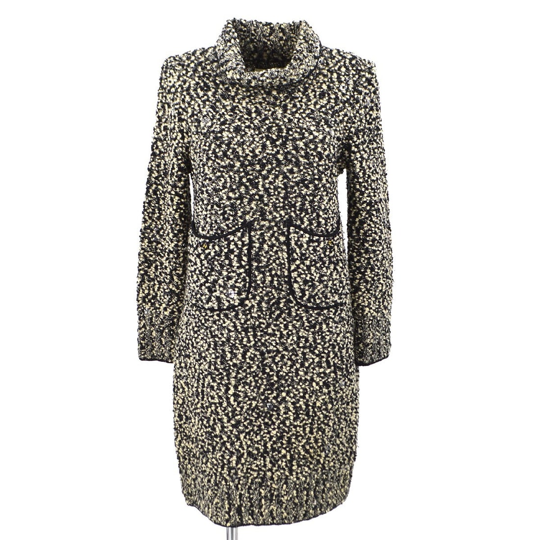 CHANEL 94A black knee length wool nylon long sleeve dress size 42: CHANEL 94A black knee length wool nylon long sleeve dress size 42 Chanel women's long-sleeve knee-length dress in black, made in Italy. This one-piece style is crafted from a wool and nylon blend and 