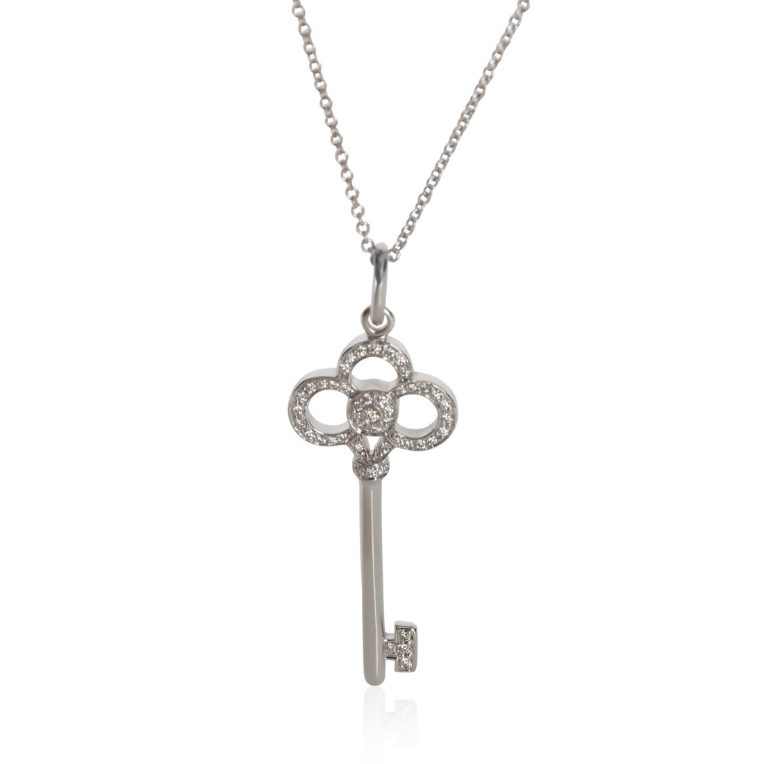 Tiffany & Co. Crown Key 18k White Gold Diamond Pendant: Tiffany & Co. Crown Key 18k White Gold Diamond Pendant This Tiffany & Co. Crown Key pendant is crafted from 18k white gold and features sparkling round brilliant diamonds with a total carat weight of 