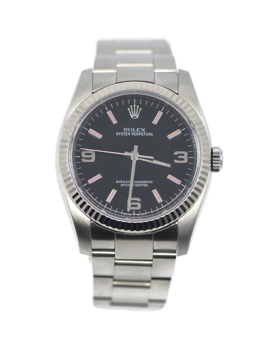 Rolex 116034 Oyster Perpetual 36mm Black Dial Steel Watch: Rolex 116034 Oyster Perpetual 36mm Black Dial Steel Watch This Rolex Oyster Perpetual is a luxury men's wristwatch featuring a stainless steel case and bracelet with a polished finish. The watch has a