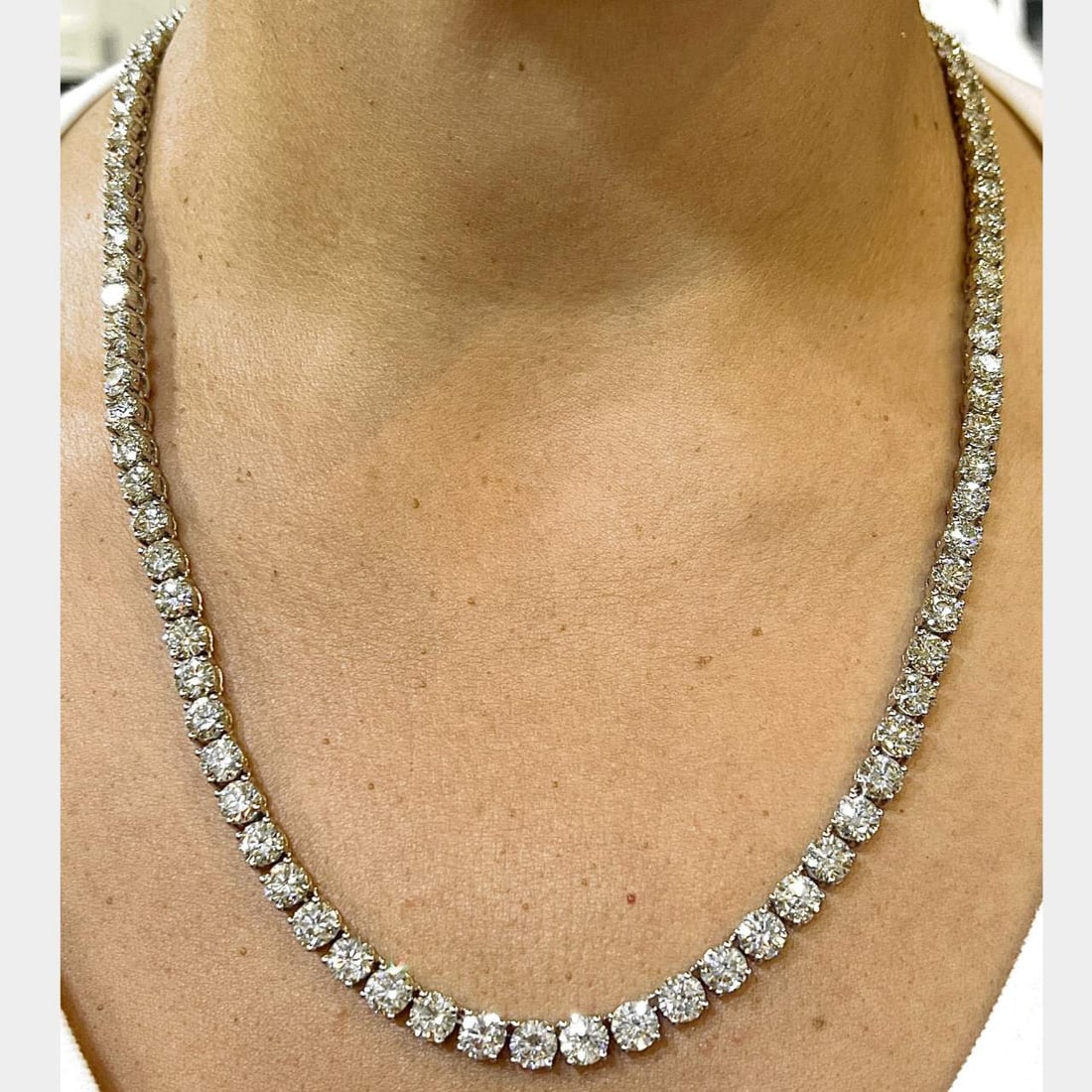 Platinum 55 Ct Diamond Tennis Necklace 99 Stones I-J Color VVS-VS Clarity: Platinum 55 Ct Diamond Tennis Necklace 99 Stones I-J Color VVS-VS Clarity This exquisite diamond tennis necklace is crafted in platinum and features a stunning total carat weight of approximately 55.0