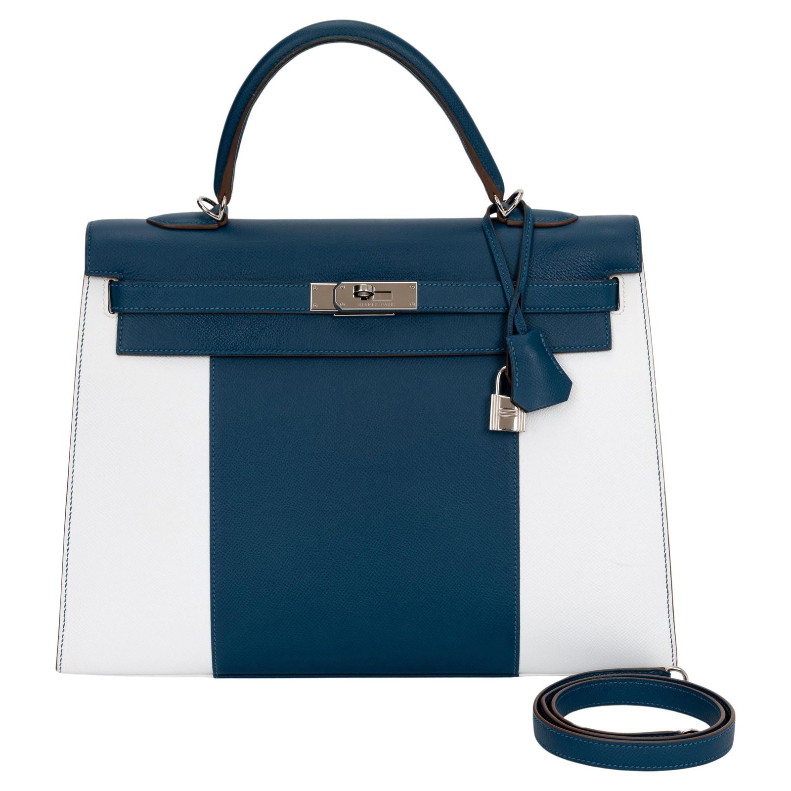 Hermes Kelly Sellier 35 Flag Handbag Bleu Thalassa White Epsom Limited Edition: Hermes Kelly Sellier 35 Flag Handbag Bleu Thalassa White Epsom Limited Edition The Hermes Kelly Sellier 35 Flag Handbag is crafted in Bleu Thalassa and White Epsom leather and features palladium hardw