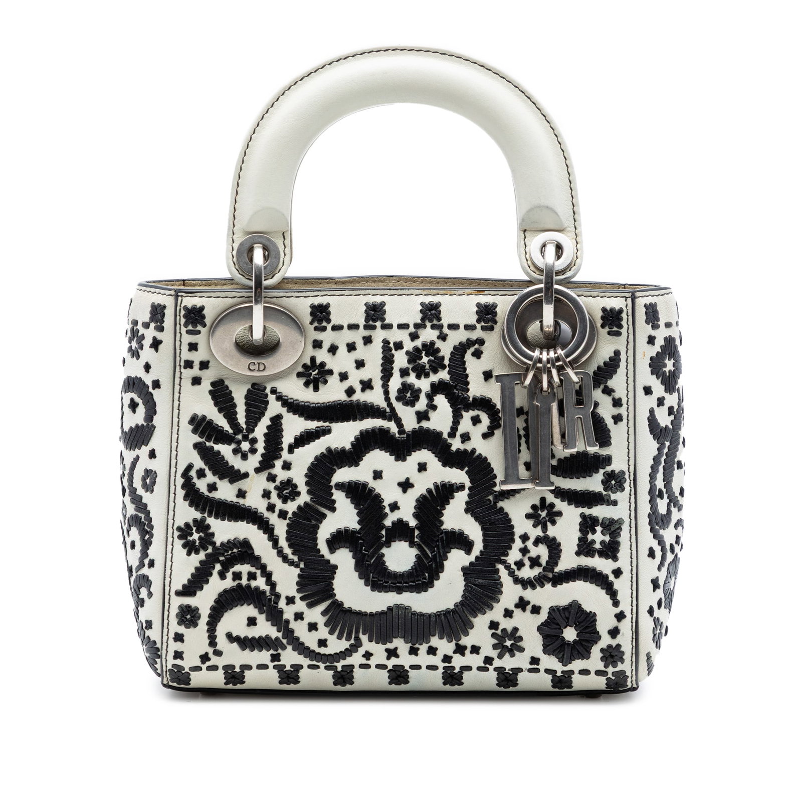 Dior Mini Calfskin Flower Embroidered Lady Bag: Dior Mini Calfskin Flower Embroidered Lady Bag This Mini Calfskin Flower Embroidered Lady Dior bag features a white embroidered leather body with flat leather top handles and a top flap closure. The i