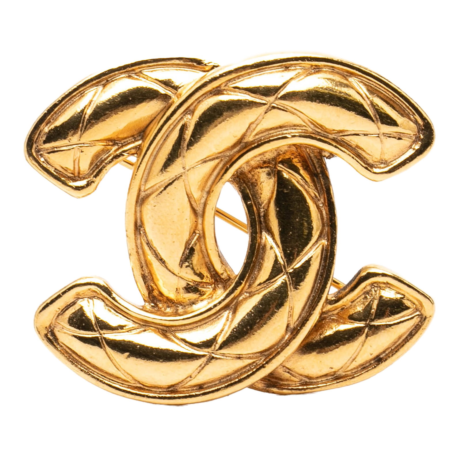 Chanel CC Quilted Gold Plated Costume Brooch: Chanel CC Quilted Gold Plated Costume Brooch This Chanel CC Gold Plated Quilted Brooch features a gold plated metal body with a quilted motif and a back pin closure. Made in France, it is categorized 