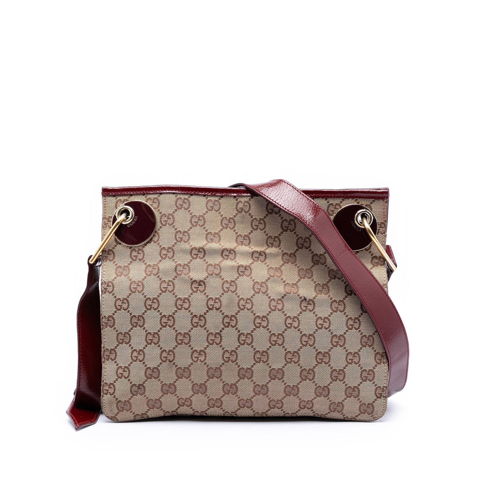 Gucci Eclipse GG Canvas Crossbody Bag with Leather Trim: Gucci Eclipse GG Canvas Crossbody Bag with Leather Trim Gucci GG Canvas Eclipse Crossbody bag crafted with a canvas body and leather trim. It features an adjustable flat leather strap, a top magnetic 