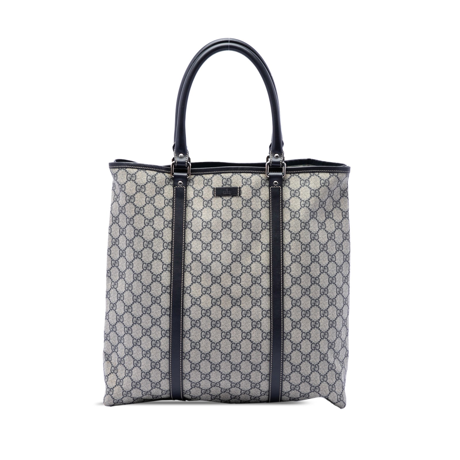 Gucci GG Supreme Joy Tote Bag in Beige Coated Canvas: Gucci GG Supreme Joy Tote Bag in Beige Coated Canvas Gucci GG Supreme Joy Vertical Tote in beige with a coated canvas body and leather trim. This open-top tote has rolled leather handles, a magnetic s