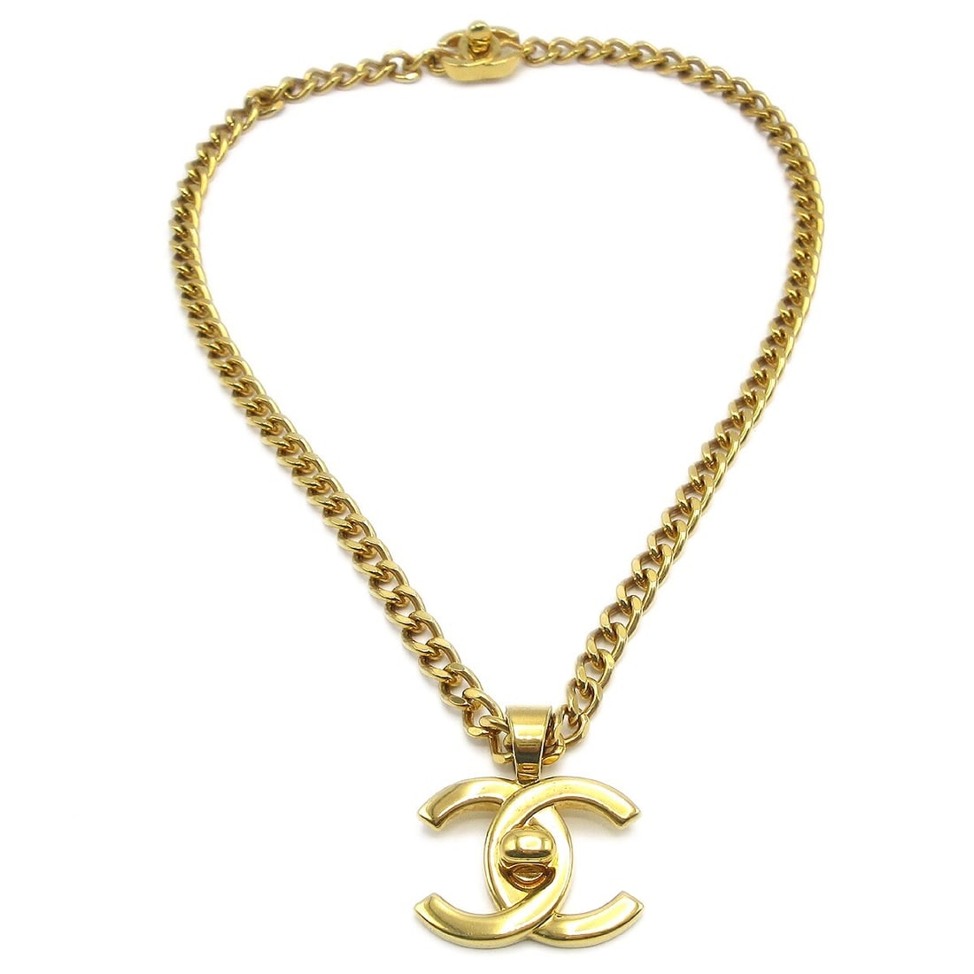 Chanel 97P Gold Plated Chain Pendant Necklace Turnlock CC Logo: Chanel 97P Gold Plated Chain Pendant Necklace Turnlock CC Logo Vintage CHANEL chain pendant necklace in gold-plated material, made in France. The necklace has a 22 in length and features a gold-tone c
