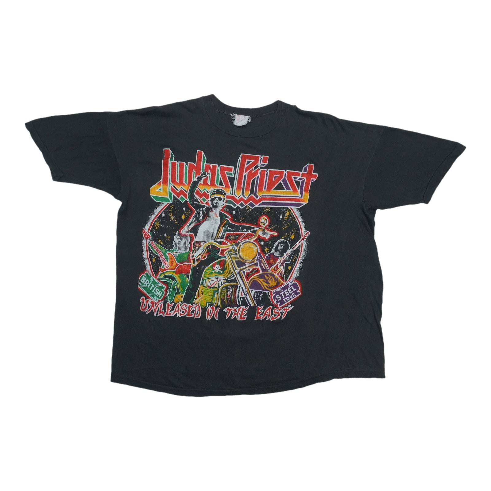 Judas Priest Unleashed in the East 1980s Black Cotton Shirt: Judas Priest Unleashed in the East 1980s Black Cotton Shirt This is an original vintage 1980s Judas Priest "Unleashed in the East" shirt. It is not a modern reproduction, offering authentic period sty