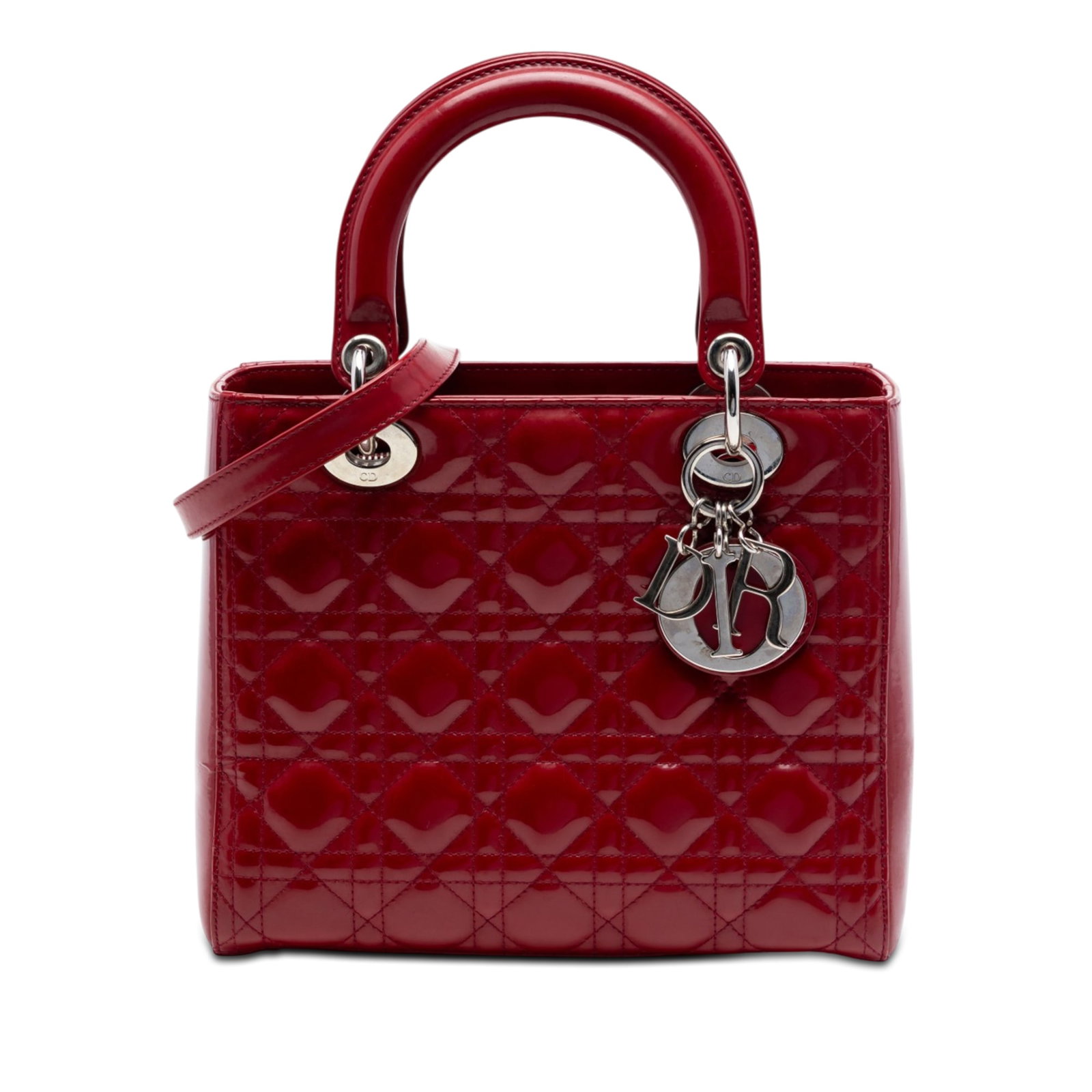 Dior Lady Dior Medium Red Patent Leather Cannage Handbag: Dior Lady Dior Medium Red Patent Leather Cannage Handbag This Medium Patent Cannage Lady Dior bag is crafted in red patent leather with a quilted body, flat leather top handles, and a detachable flat 