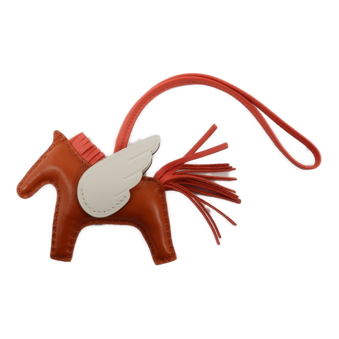 HERMES Rodeo Pegase PM charm lambskin calfskin France: HERMES Rodeo Pegase PM charm lambskin calfskin France Hermes Rodeo Pegase PM charm in a multicolor design, made with lambskin (sheep leather) and calfskin (cowhide). It is identified as a charm style 