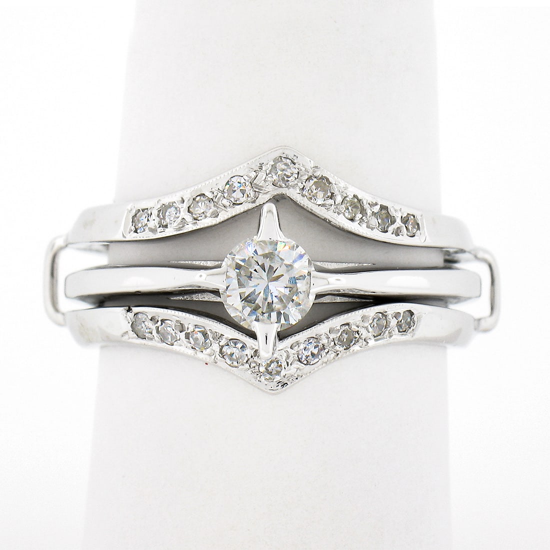 Vintage 14K White Gold 0.62ctw Diamond Solitaire Engagement & Wedding Ring Set: Vintage 14K White Gold 0.62ctw Diamond Solitaire Engagement & Wedding Ring Set This exquisite Vintage 14K White Gold engagement and wedding ring set features a stunning 0.62 carat total weight of diam
