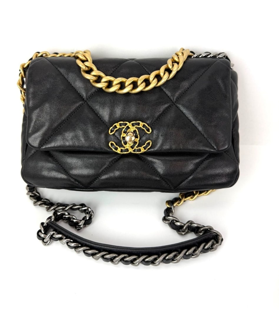 Chanel 19 Small Black Lambskin Shoulder Bag with Multicolor Chain Strap: Chanel 19 Small Black Lambskin Shoulder Bag with Multicolor Chain Strap This Chanel 19 shoulder bag features a black lambskin leather exterior with a quilted diamond pattern and a classic rectangular 