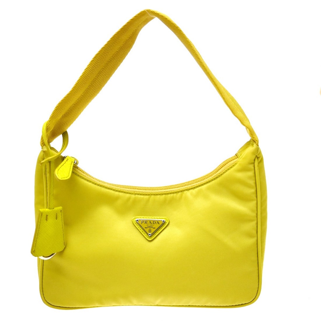 Prada Nylon Handbag Yellow with Key Ring Italy: Prada Nylon Handbag Yellow with Key Ring Italy Prada yellow nylon handbag made in Italy. It features a compact silhouette with a handle drop of 4.7 in (12.0 cm). The bag is described as being in fair 
