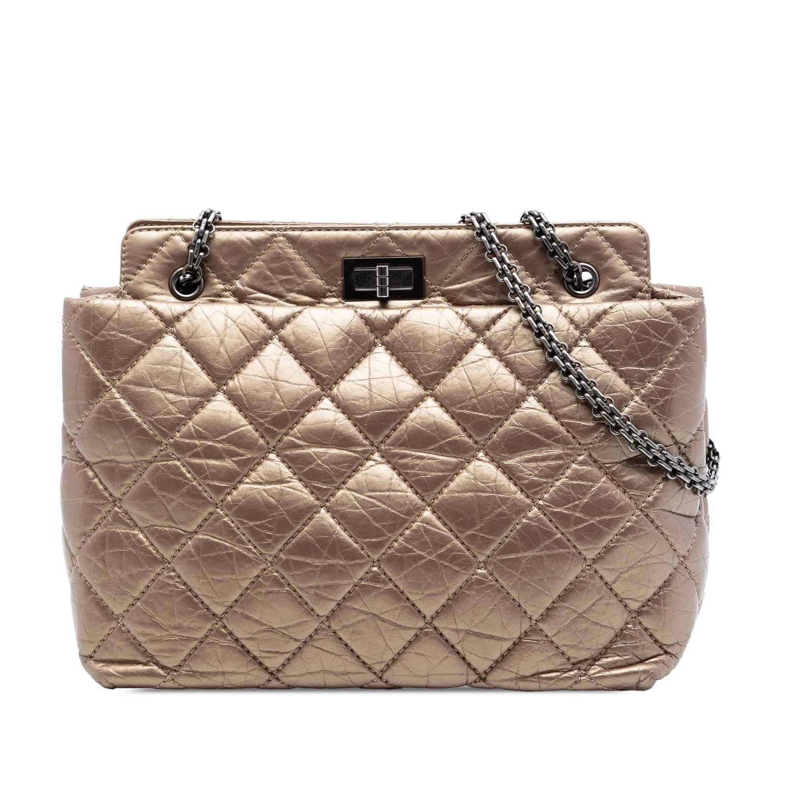 Chanel Reissue 2.55 quilted calfskin tote bag: Chanel Reissue 2.55 quilted calfskin tote bag This Chanel Quilted Aged Calfskin Reissue 2.55 Tote is crafted from quilted aged calf leather in a brown tone and features chain link straps. The bag is d