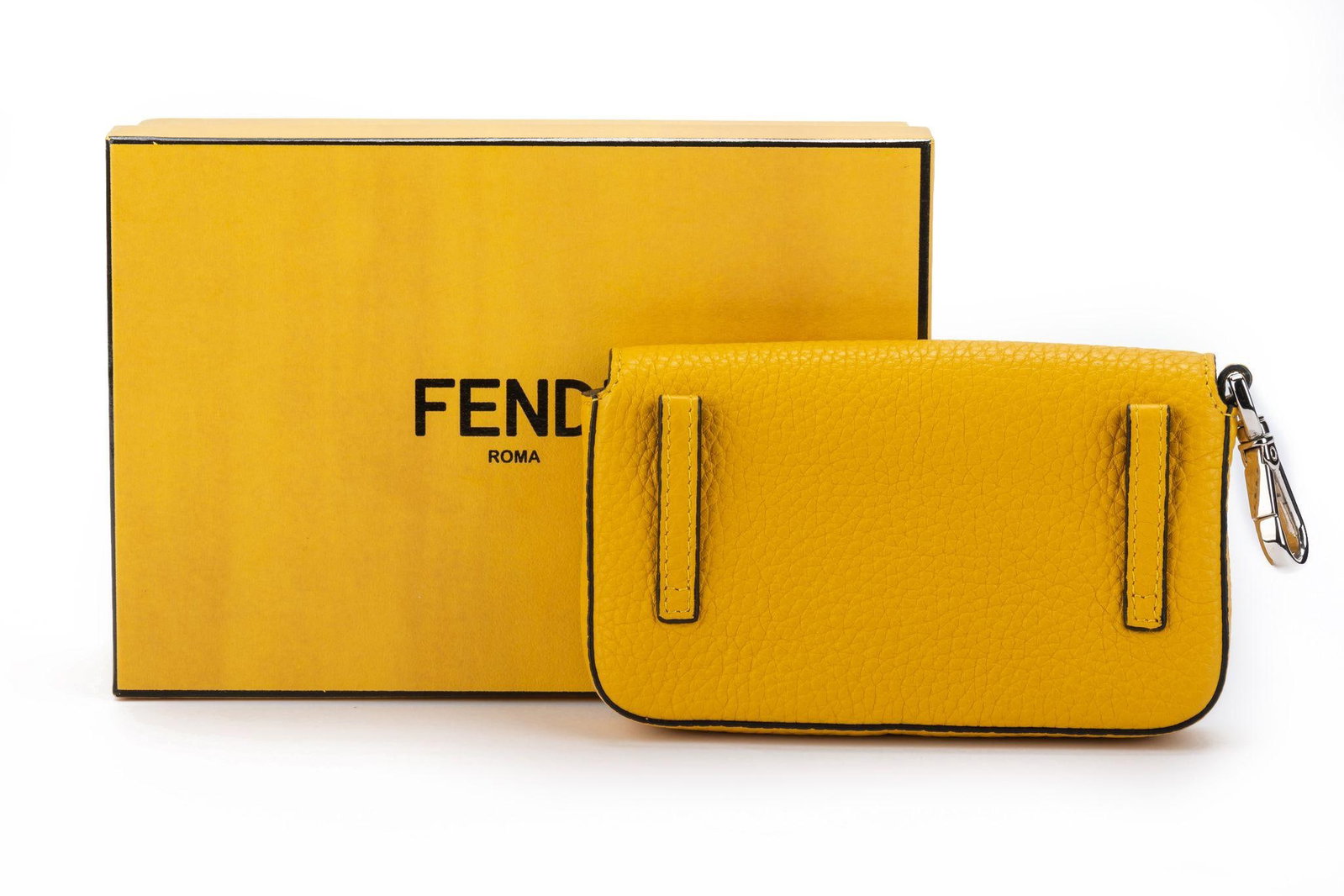 Fendi Yellow Micro Baguette New with Box and Dustcover: Fendi Yellow Micro Baguette New with Box and Dustcover Introducing the exquisite Fendi Yellow Micro Baguette, a stunning addition to any fashion collection. This designer handbag features a vibrant ye
