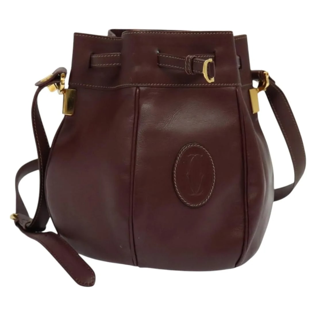Must de cartier burgundy leather shoulder bag for women: Must de cartier burgundy leather shoulder bag for women This Cartier Must de Cartier bag is crafted from leather in a rich burgundy color and is designed for women. The bag features a structured silho