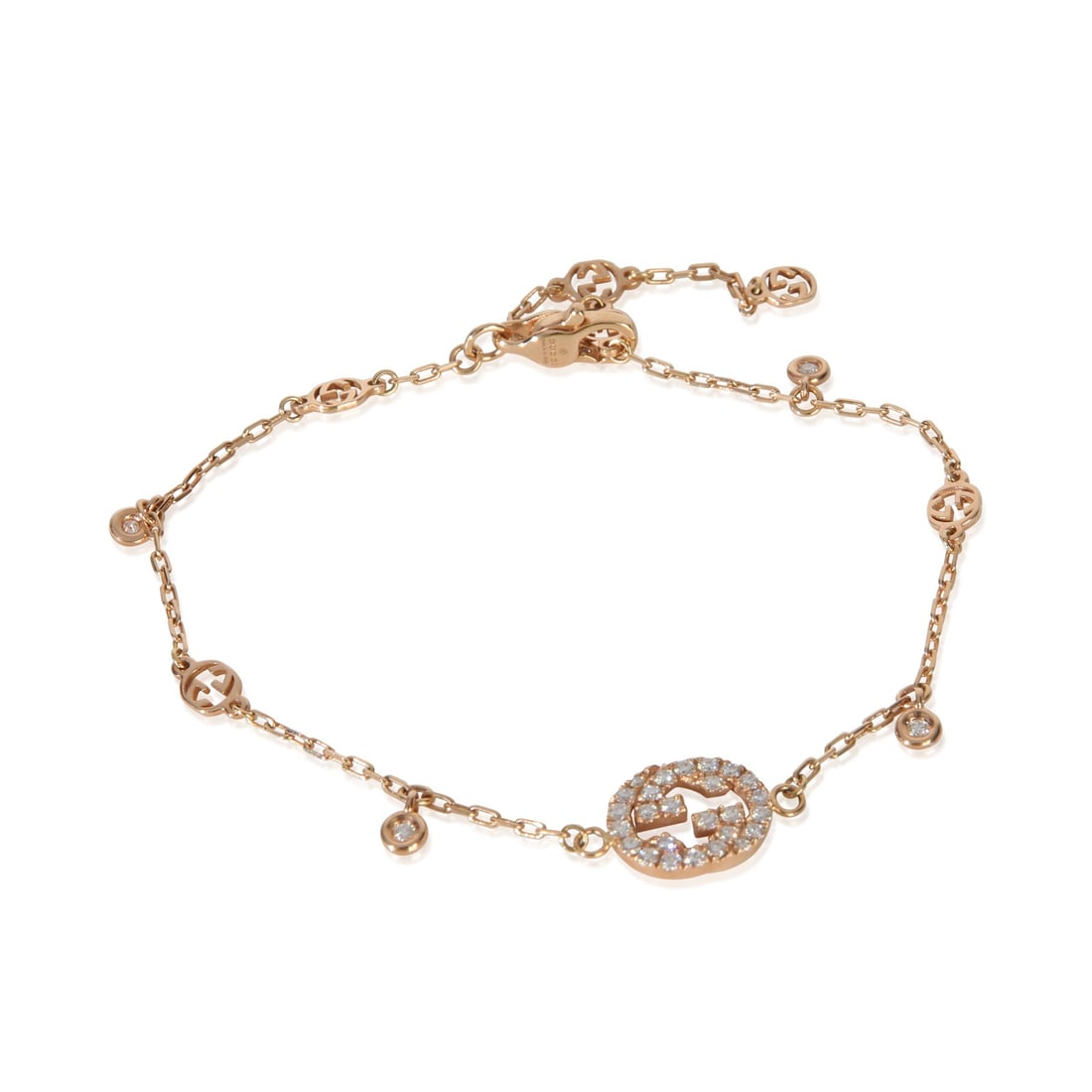 Gucci Interlocking G 18k Rose Gold Diamond Bracelet: Gucci Interlocking G 18k Rose Gold Diamond Bracelet This pre-owned Gucci Interlocking G bracelet is crafted from 18k rose gold and features round brilliant cut diamonds with a total weight of 0.20 car