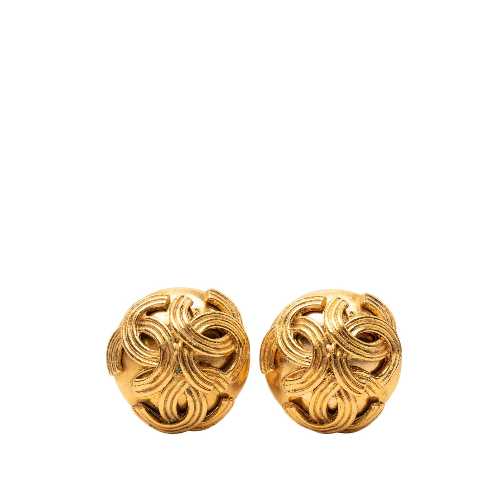 Chanel Triple CC Gold Plated Metal Clip On Earrings: Chanel Triple CC Gold Plated Metal Clip On Earrings These Chanel earrings feature a gold plated metal body with iconic triple CC detailing and clip-on closures. Made in France, these costume earrings 