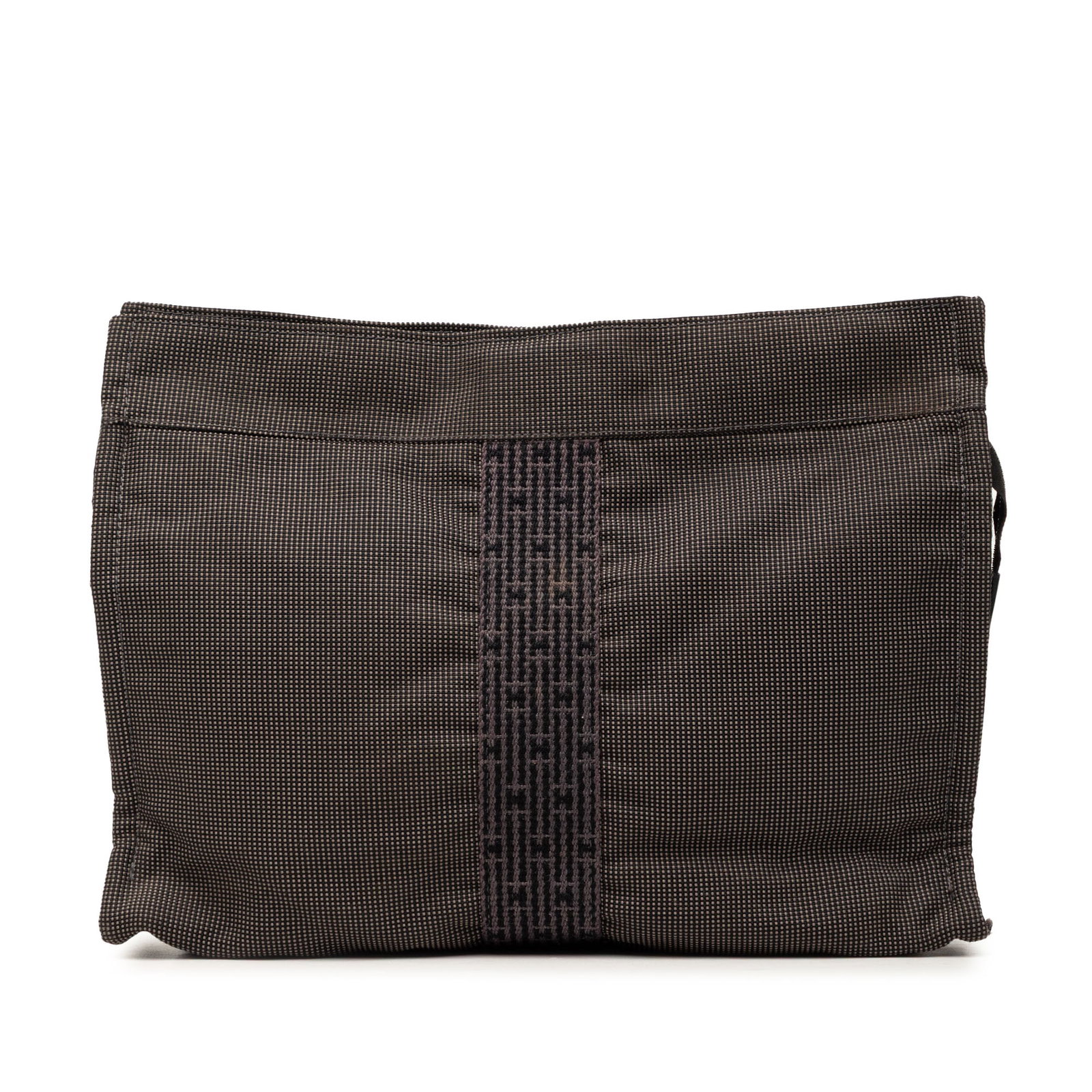 Hermes Herline Gray Canvas Zip Clutch Bag: Hermes Herline Gray Canvas Zip Clutch Bag This Hermes Herline clutch is crafted from canvas with a top zip closure and interior slip pockets. The piece shows visible wear and use, including staining t