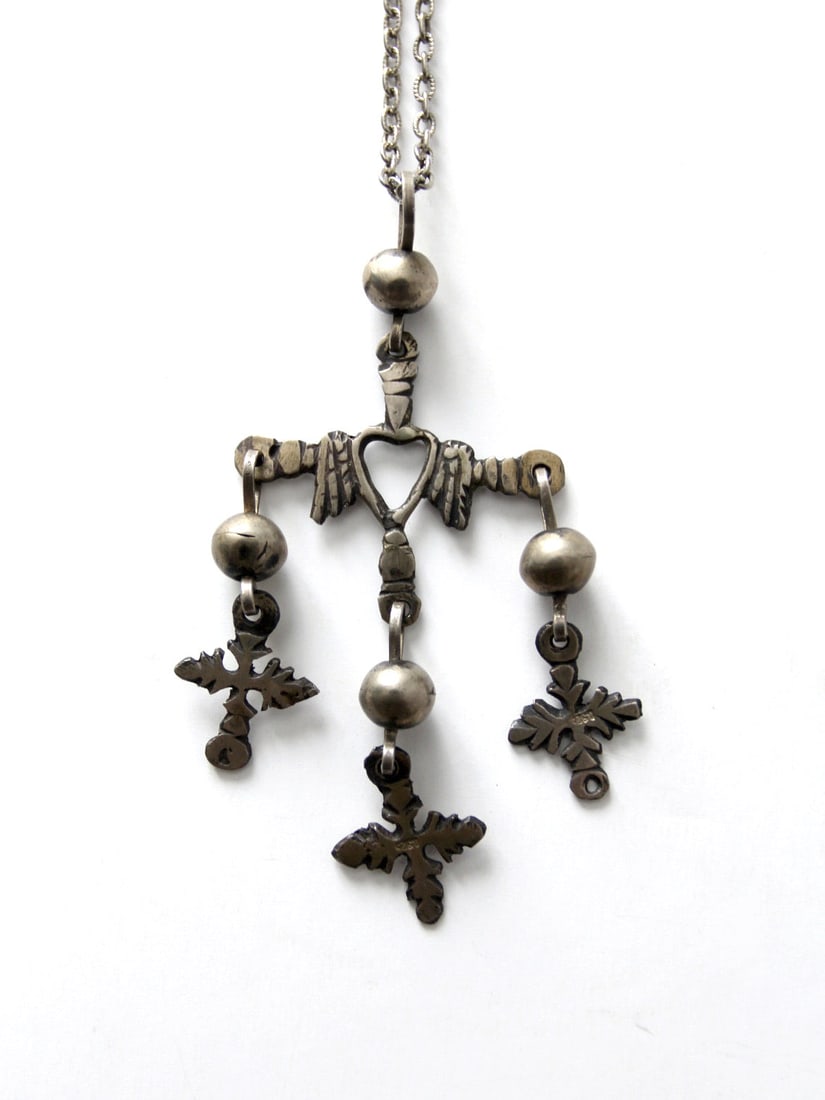 Vintage Yalalag Sterling Silver Cross Necklace with Pendants: Vintage Yalalag Sterling Silver Cross Necklace with Pendants This vintage Yalalag Mexican silver cross necklace showcases exquisite craftsmanship with a sterling silver cross adorned with three hangin