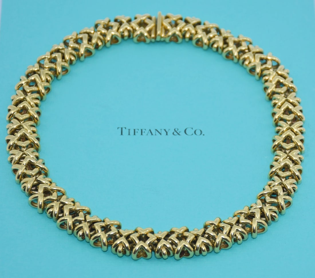 Tiffany & Co 18K Yellow Gold Chain Necklace 16 Inch: Tiffany & Co 18K Yellow Gold Chain Necklace 16 Inch This Tiffany & Co. necklace is crafted from 18K yellow gold and features a classic chain style without any stones. Made in Italy, it measures 16 inc