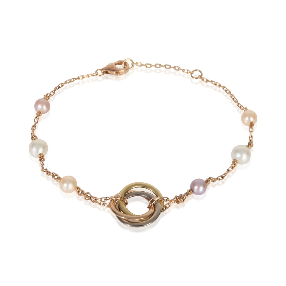 Cartier Trinity Pearl 18k 3 Tone Gold Bracelet 7.5 in: Cartier Trinity Pearl 18k 3 Tone Gold Bracelet 7.5 in This Cartier Trinity bracelet features elegant 18k three-tone gold and lustrous pearls, creating a timeless and sophisticated accessory. The brace